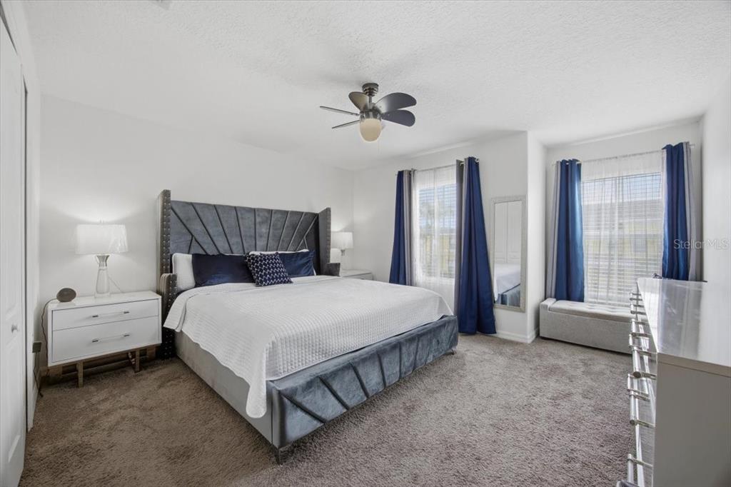 5410 Quarry Rock Road Lakeland, FL 33809 - Photo 16 of 26 a bedroom with a bed and a couch