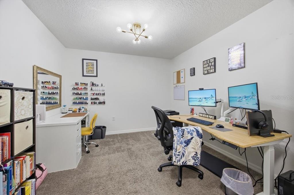 5410 Quarry Rock Road Lakeland, FL 33809 - Photo 22 of 26 a view of a workspace with furniture