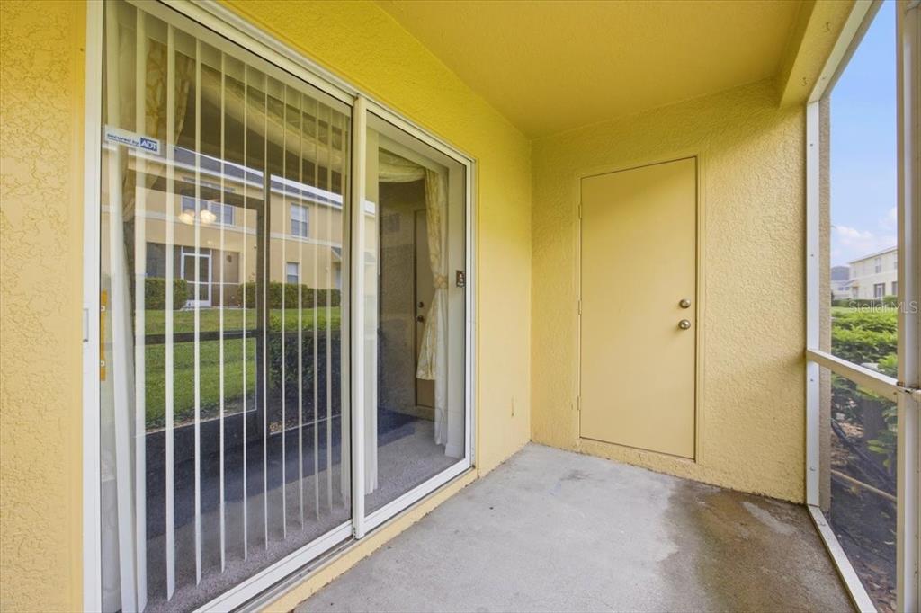 5410 Quarry Rock Road Lakeland, FL 33809 - Photo 25 of 26 a view of a porch with a door