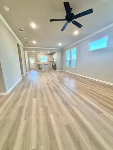 a bathroom with a granite countertop sink a bathtub and shower