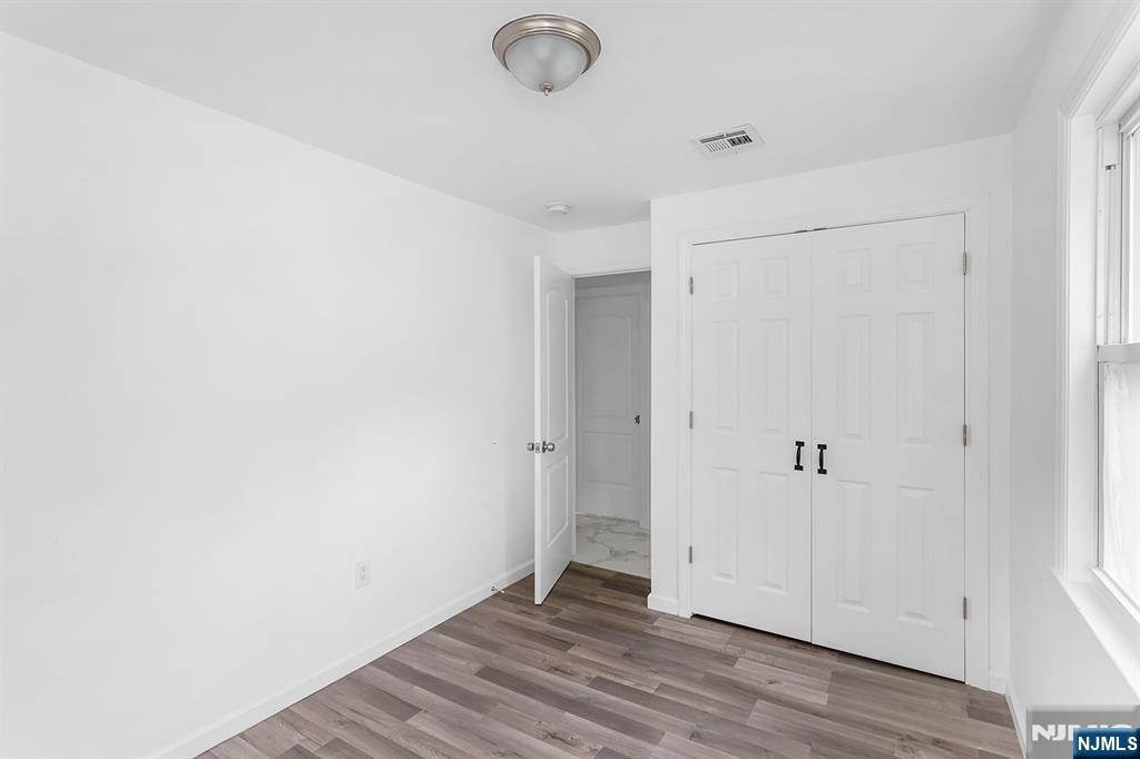 67 Nolans Point Road Lake Hopatcong, NJ 07849 - Photo 23 of 43 a view of a livingroom with wooden floor