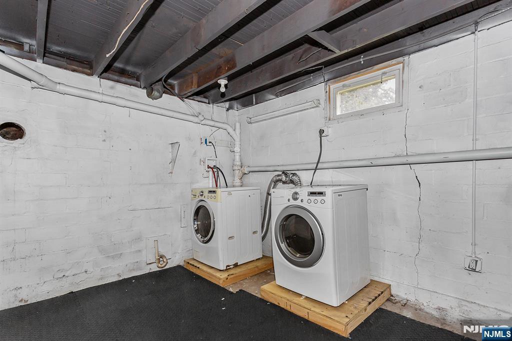 67 Nolans Point Road Lake Hopatcong, NJ 07849 - Photo 26 of 43 a utility room with dryer and washer