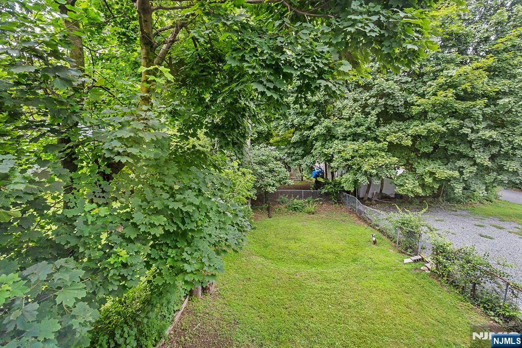67 Nolans Point Road Lake Hopatcong, NJ 07849 - Photo 28 of 43 a view of a lake with a yard