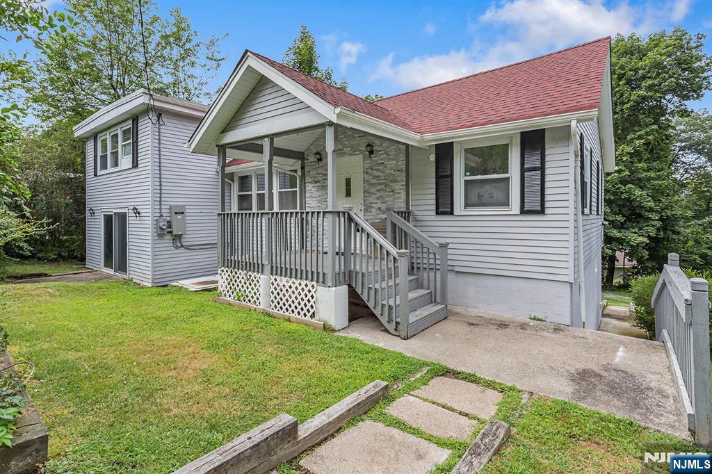 67 Nolans Point Road Lake Hopatcong, NJ 07849 - Photo 32 of 43 a front view of a house with a yard
