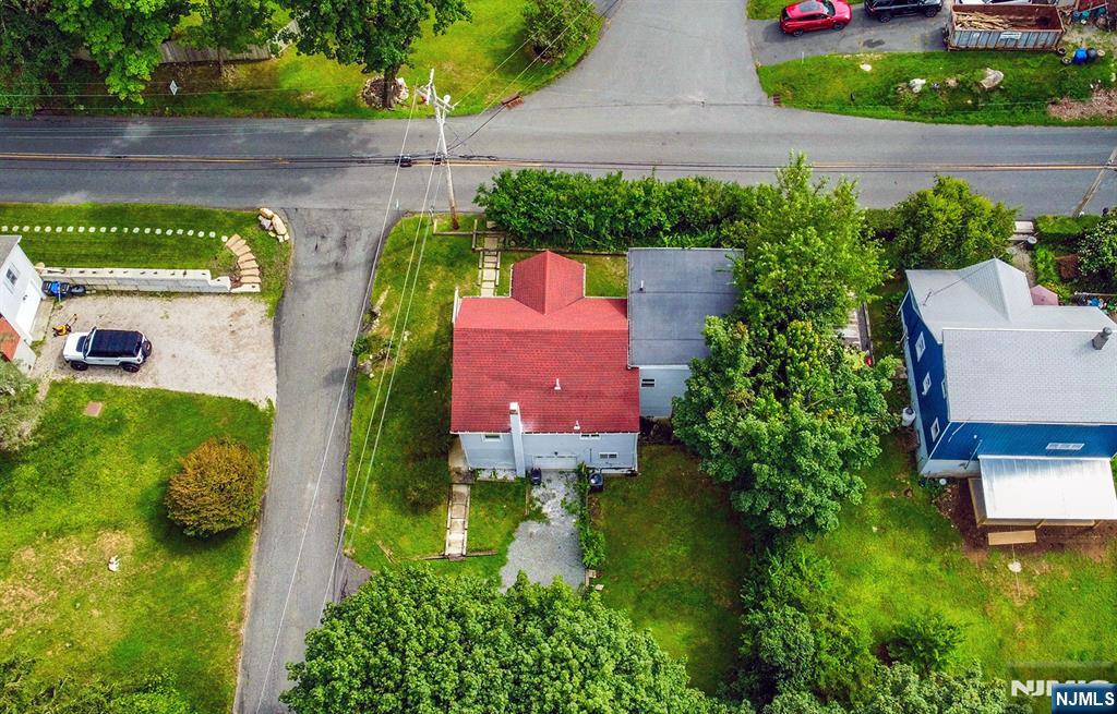 67 Nolans Point Road Lake Hopatcong, NJ 07849 - Photo 43 of 43 a aerial view of a house with a garden and a yard