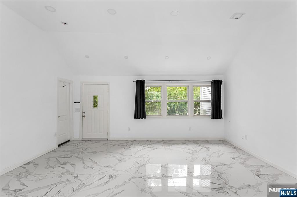 67 Nolans Point Road Lake Hopatcong, NJ 07849 - Photo 5 of 43 a view of an empty room with a window