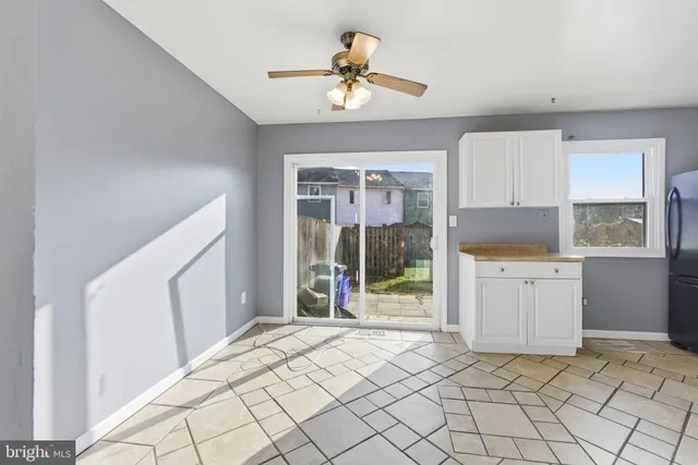 a bedroom with a bed and a mirror