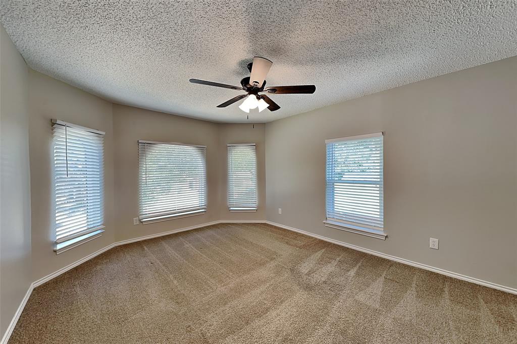 1008 Timberline Lane Allen, TX 75002 - Photo 14 of 25 a view of an empty room with a window