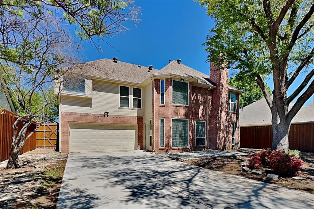 1008 Timberline Lane Allen, TX 75002 - Photo 23 of 25 a front view of a house with a garden