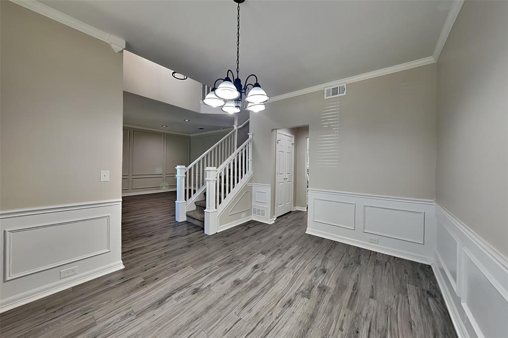 1008 Timberline Lane Allen, TX 75002 - Photo 8 of 25 a view of an entryway with wooden floor