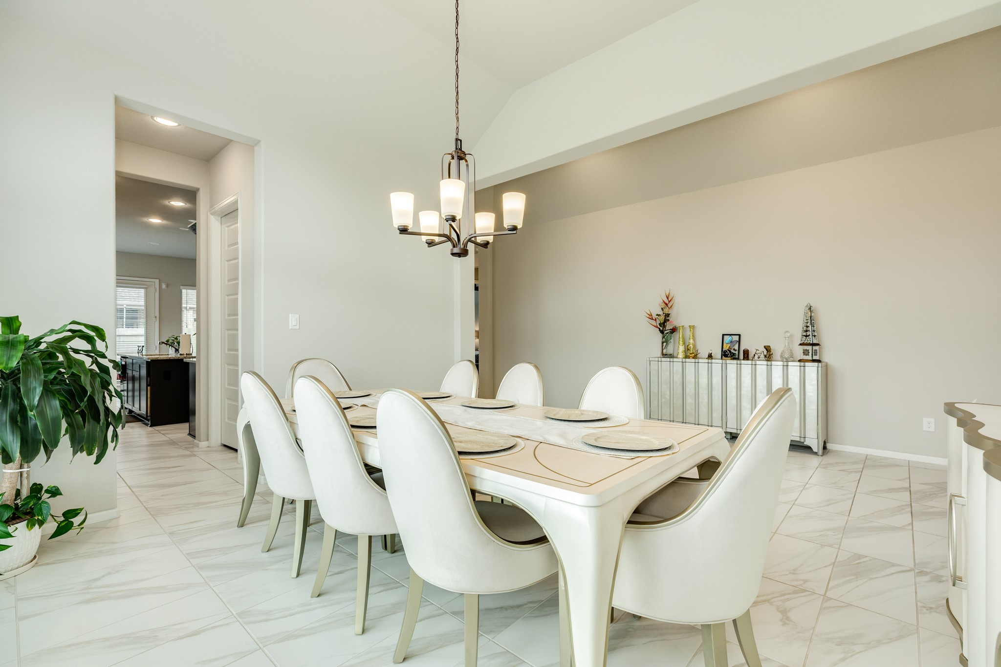 5138 Walnut Grv Lane Manvel, TX 77578 - Photo 20 of 43 a view of a dining room with furniture and chandelier