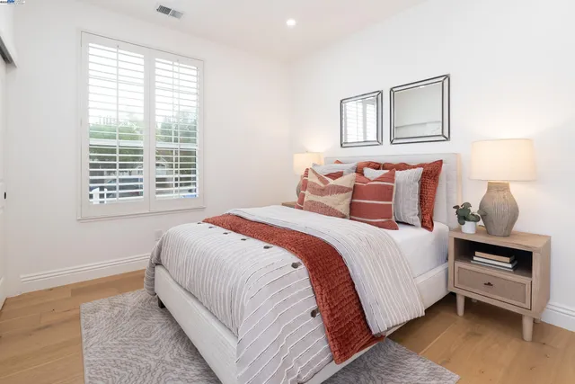 a kitchen with a window cabinets and stainless steel appliances