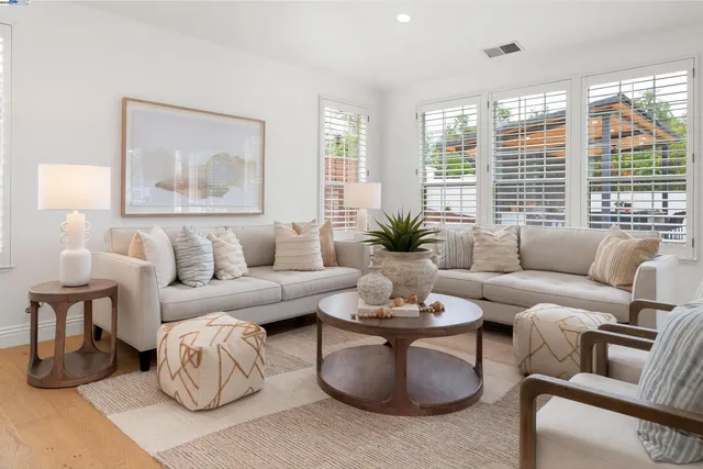 a view of a room with a window and balcony