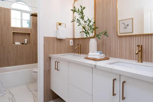 a view of house with swimming pool outdoor seating