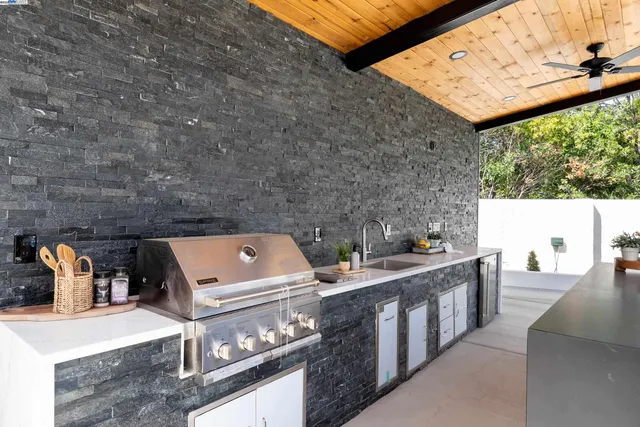 a view of a livingroom with furniture and a window