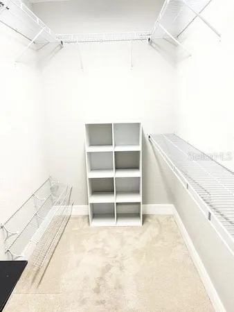 a view of a room with racks on the wall