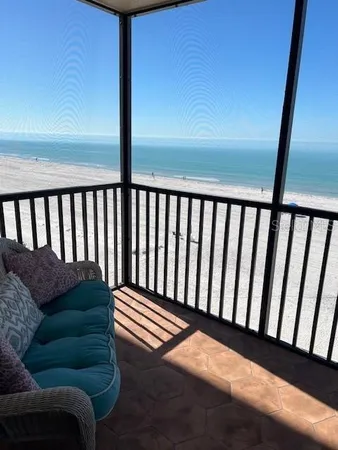 a balcony with a couch