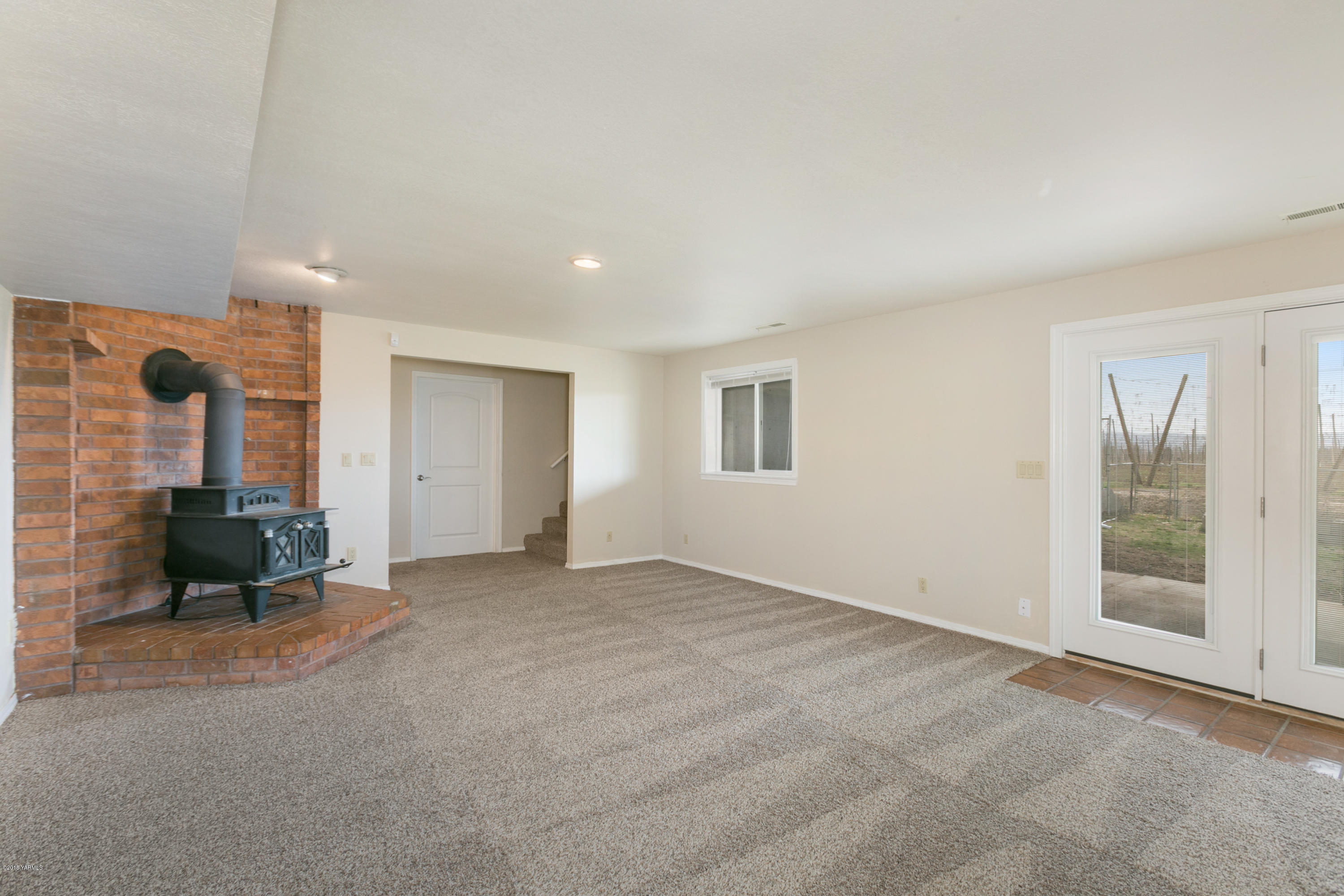 1004 Birchfield Road Yakima, WA 98901 - Photo 17 of 23 a view of an empty room with a window