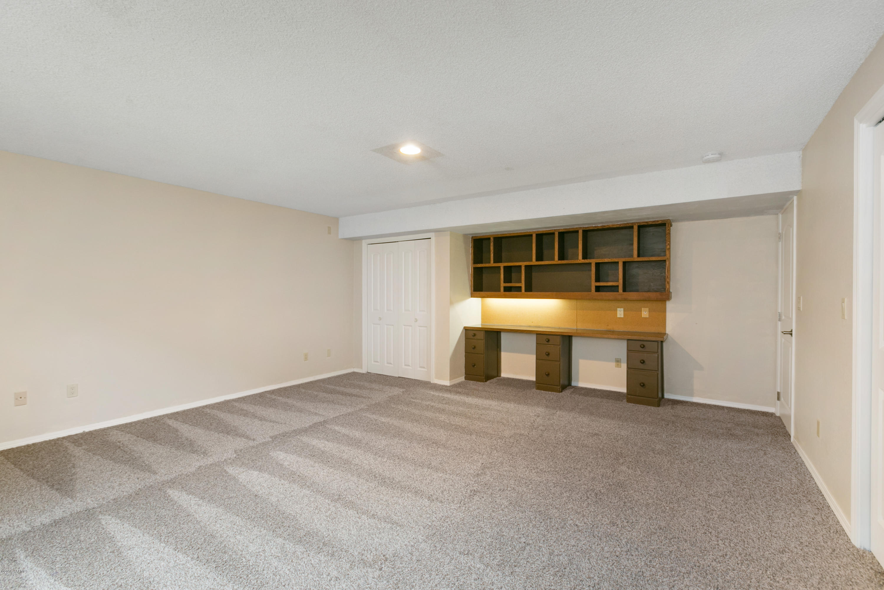 1004 Birchfield Road Yakima, WA 98901 - Photo 20 of 23 a view of an empty room with a window
