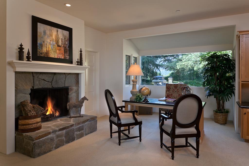 350 Woodley Road Santa Barbara, CA 93108 - Photo 12 of 26 a living room with furniture fireplace and window