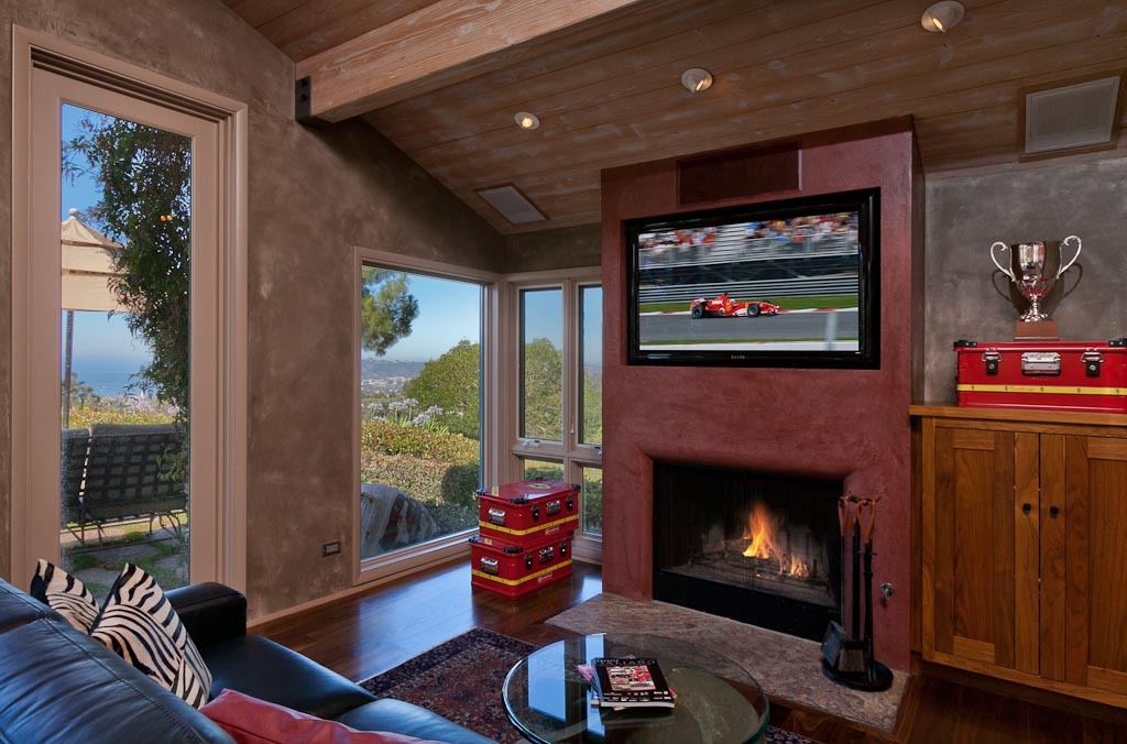 350 Woodley Road Santa Barbara, CA 93108 - Photo 16 of 26 a living room with furniture and a fireplace