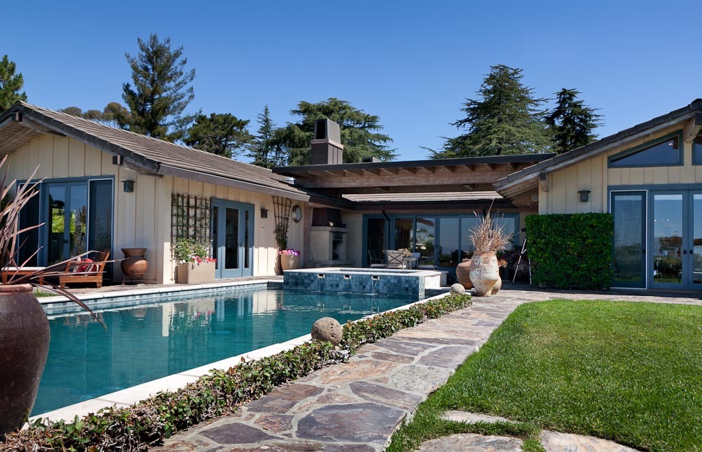 350 Woodley Road Santa Barbara, CA 93108 - Photo 21 of 26 a view of a house with swimming pool and sitting area