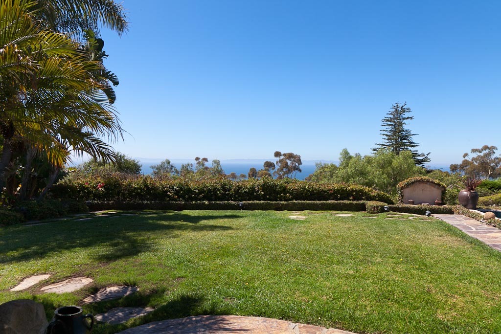 350 Woodley Road Santa Barbara, CA 93108 - Photo 23 of 26 a view of a lake from a yard
