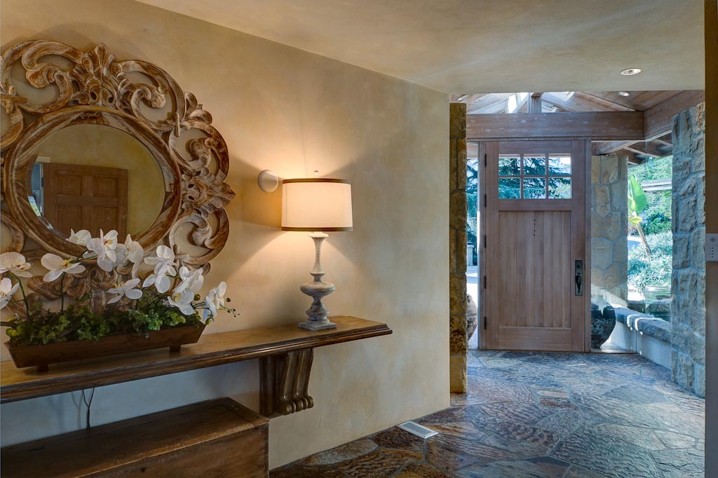 350 Woodley Road Santa Barbara, CA 93108 - Photo 3 of 26 a view of a entryway door of the house and wooden floor