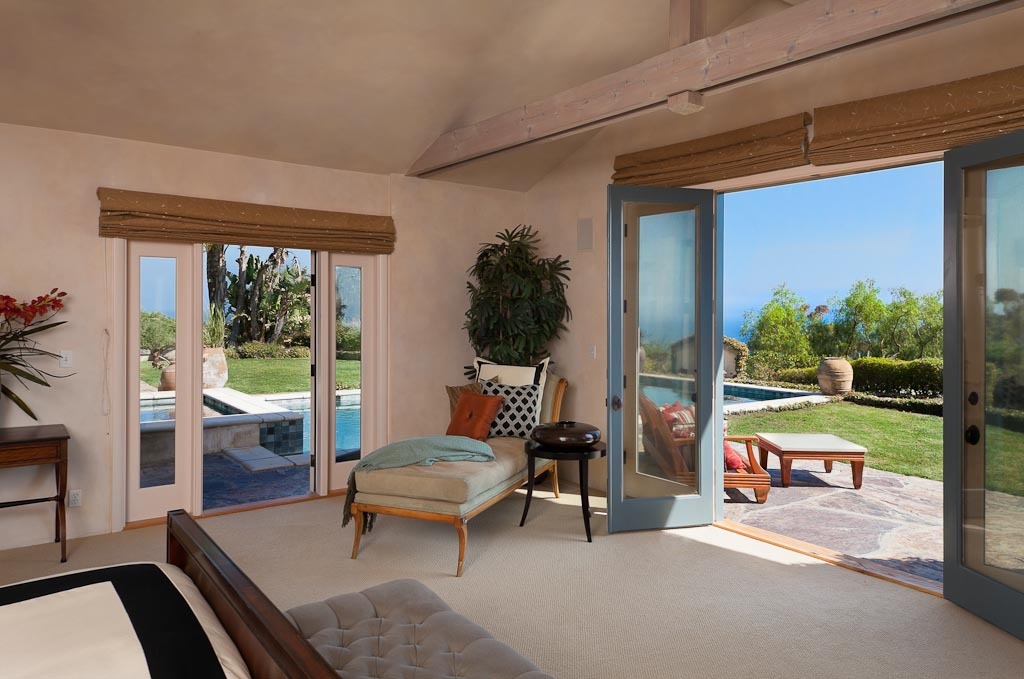 350 Woodley Road Santa Barbara, CA 93108 - Photo 9 of 26 a living room with furniture and a large window