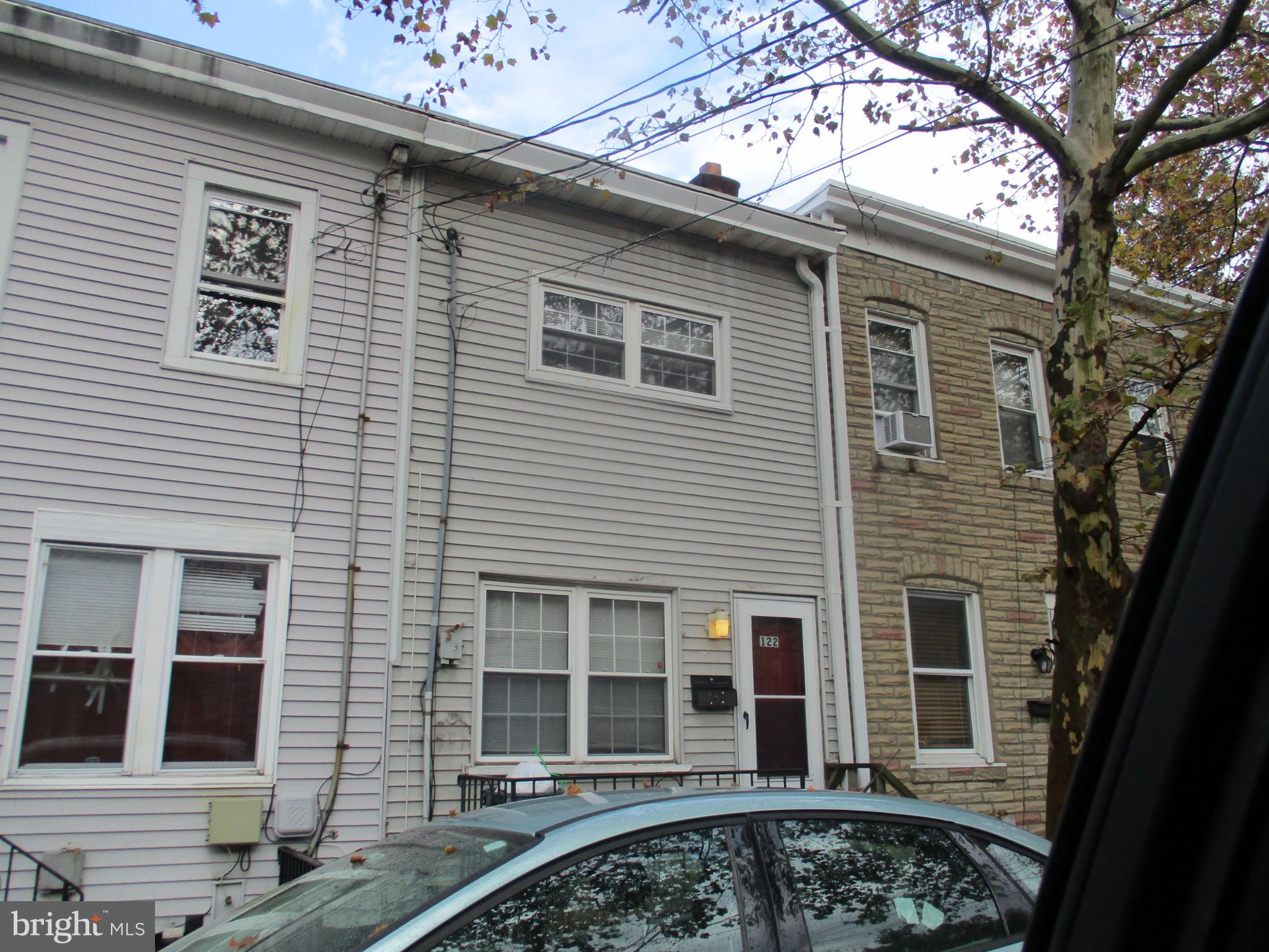 122 Hewitt Street Trenton, NJ 08611 - Photo 2 of 15 a front view of a house with a large windows