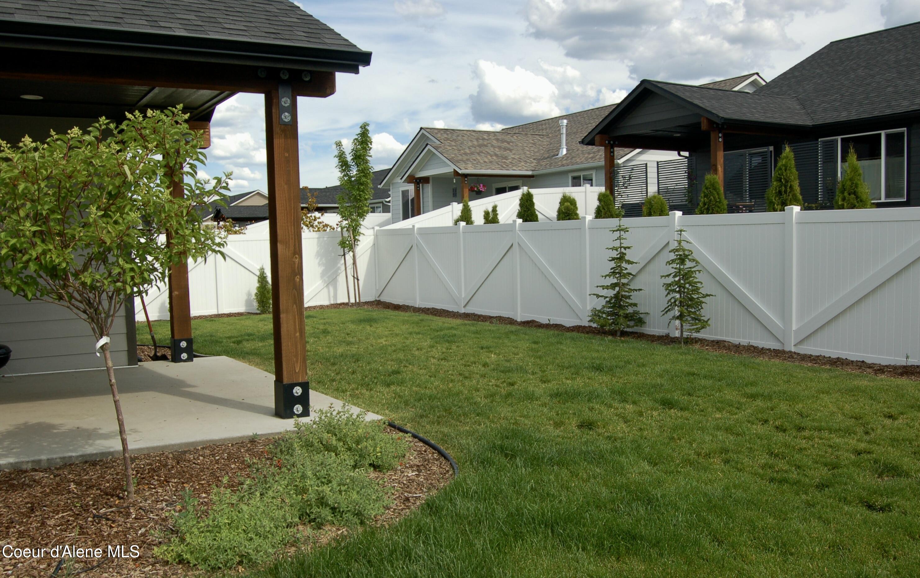 9060 West Oats Avenue Rathdrum, ID 83858 - Photo 22 of 28 BACK AND COVERED PATIO