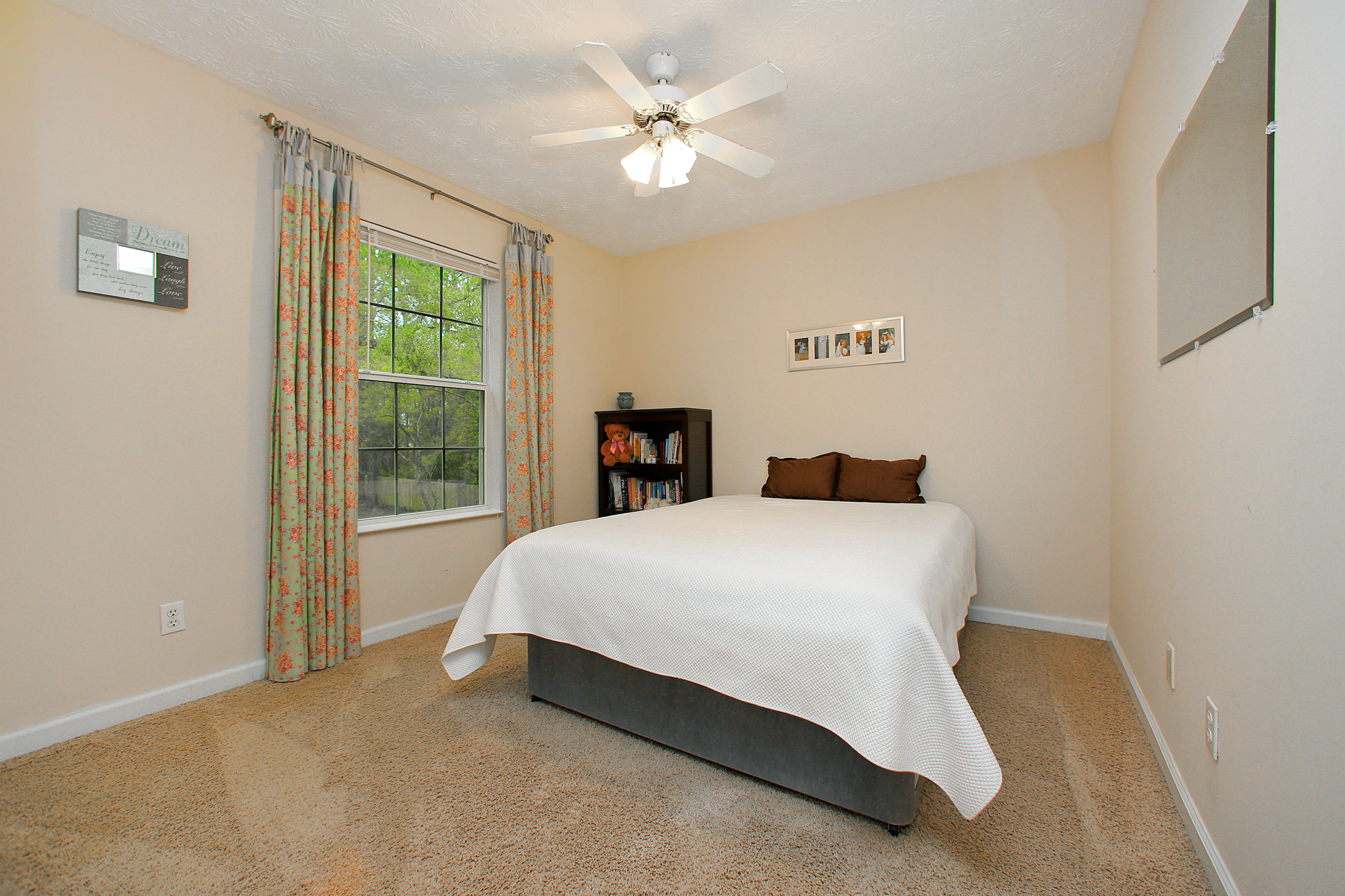 781 Bay Grove Road Freeport, FL 32439 - Photo 12 of 19 a bedroom with a bed and a window