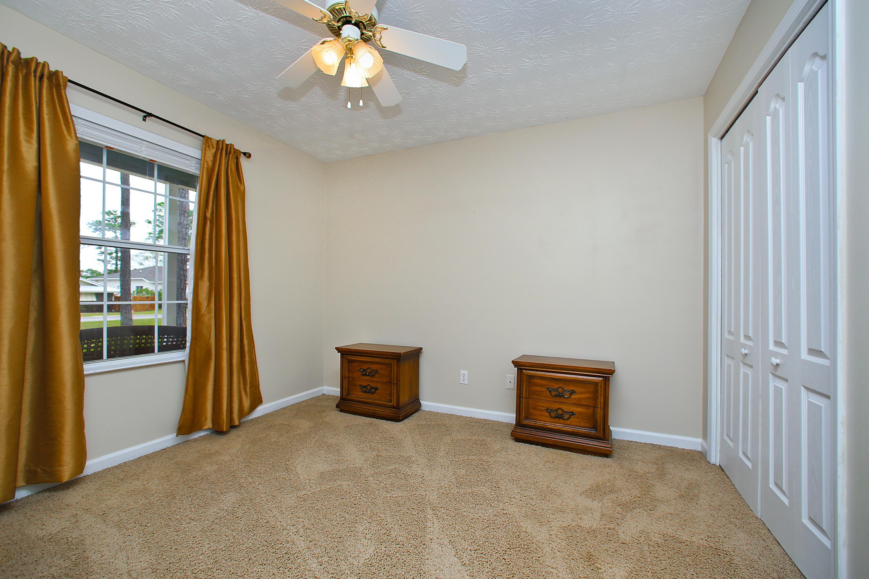 781 Bay Grove Road Freeport, FL 32439 - Photo 15 of 19 a view of an empty room with a window