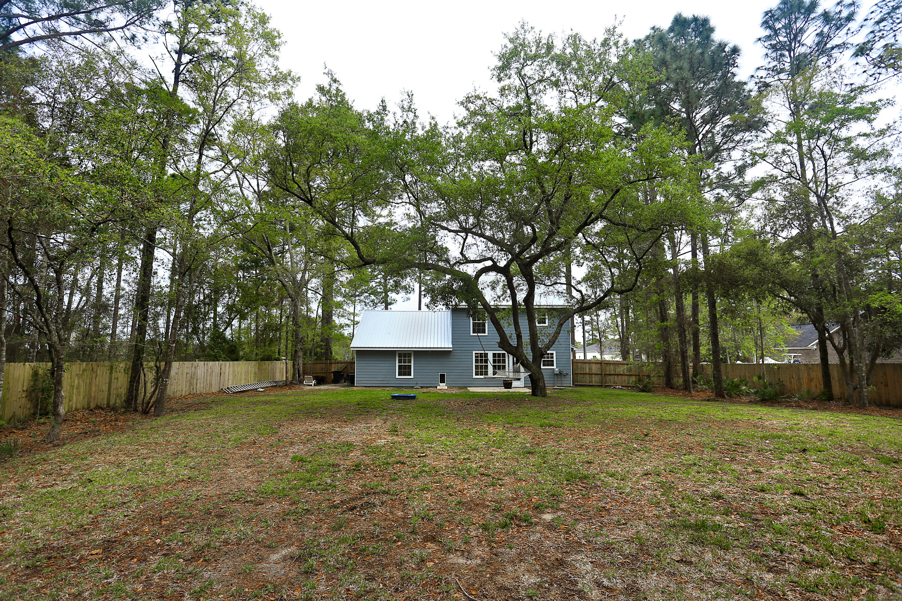 781 Bay Grove Road Freeport, FL 32439 - Photo 17 of 19 a view of a house with a yard