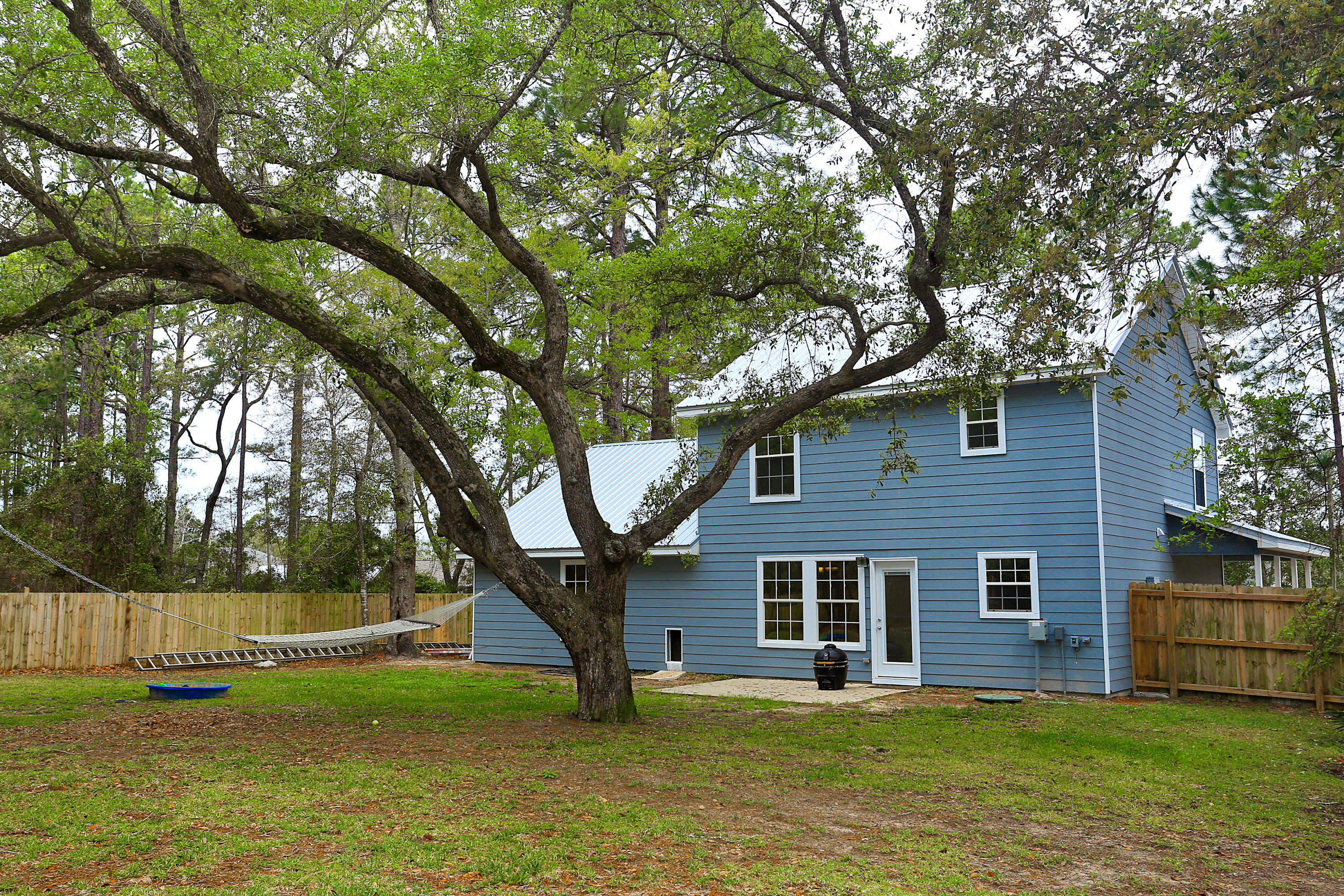 781 Bay Grove Road Freeport, FL 32439 - Photo 2 of 19 a view of a house with a yard
