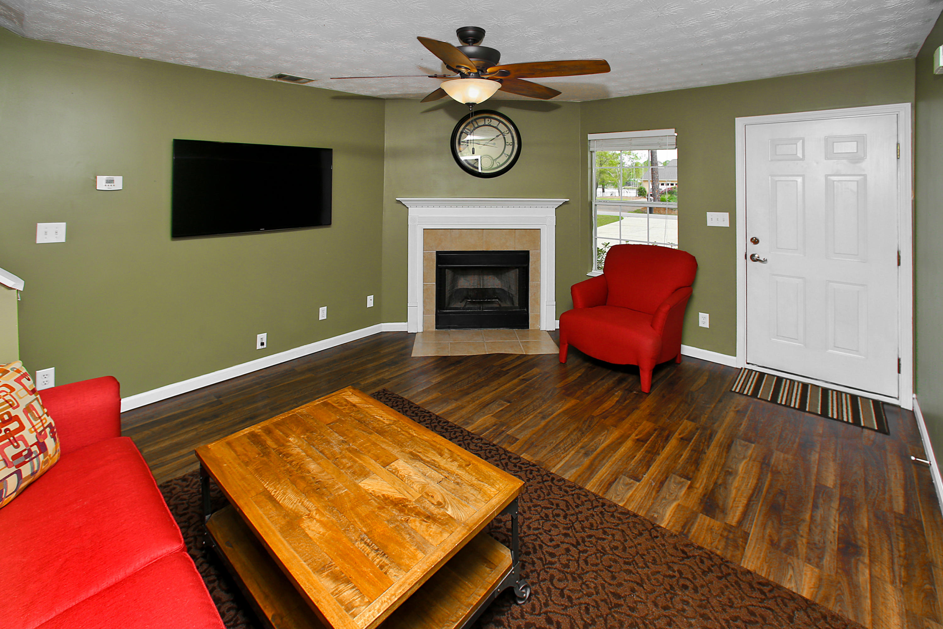 781 Bay Grove Road Freeport, FL 32439 - Photo 3 of 19 a living room with furniture pool table and a fireplace