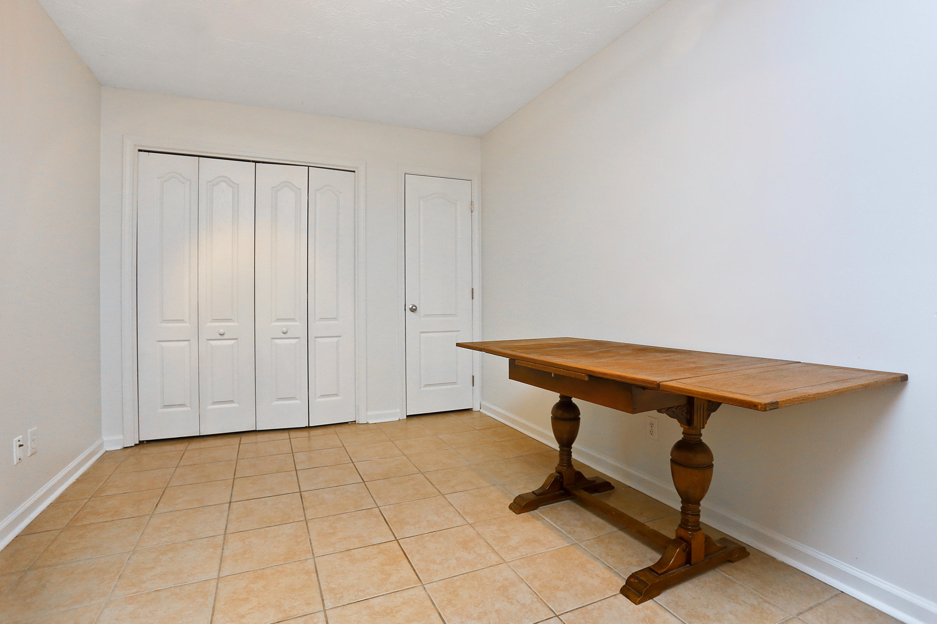 781 Bay Grove Road Freeport, FL 32439 - Photo 6 of 19 a view of an empty room with wooden floor