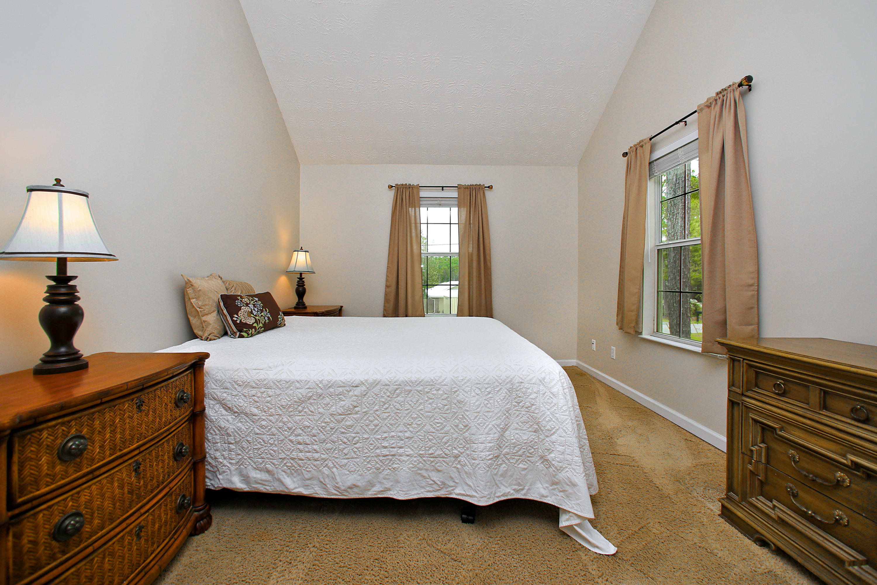 781 Bay Grove Road Freeport, FL 32439 - Photo 7 of 19 a bedroom with a bed and a window