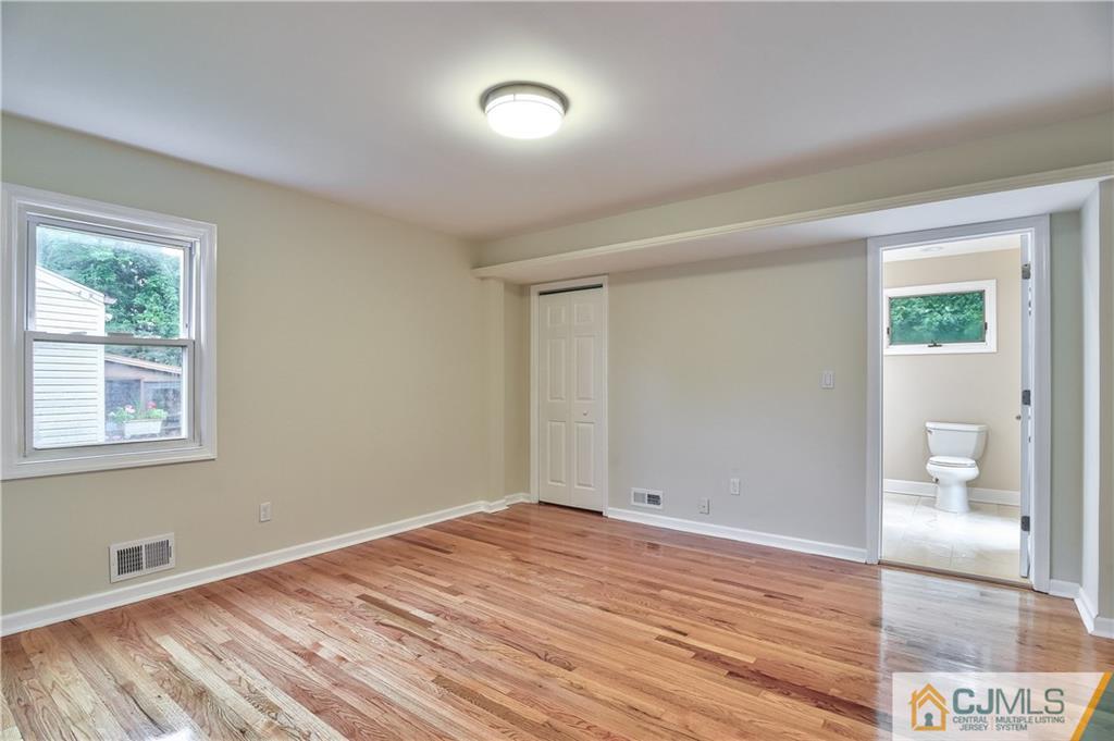 113 Stony Road Edison, NJ 08817 - Photo 15 of 20 a view of an empty room and window