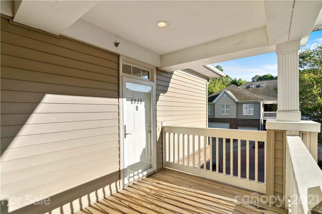 8929 Rosalyn Glen Road, Unit 108 Cornelius, NC 28031 - Photo 2 of 28 a view of a house with a deck