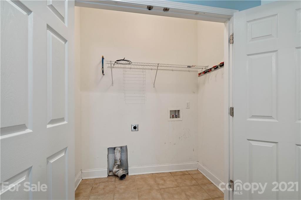 8929 Rosalyn Glen Road, Unit 108 Cornelius, NC 28031 - Photo 15 of 28 a view of room with hallway