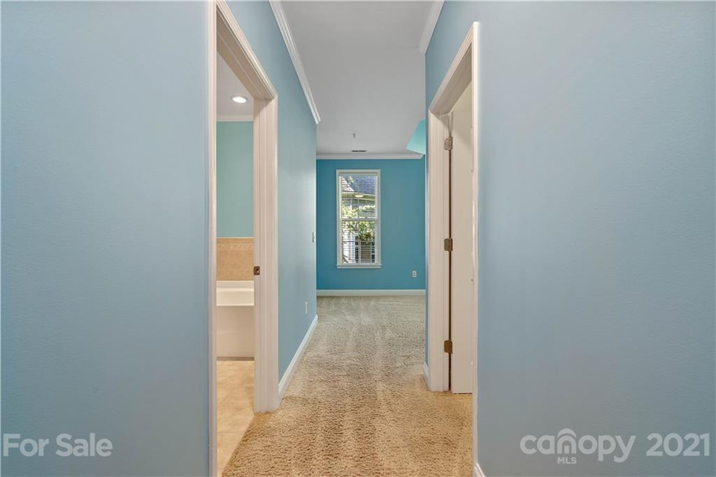 8929 Rosalyn Glen Road, Unit 108 Cornelius, NC 28031 - Photo 17 of 28 a view of hallway with stairs