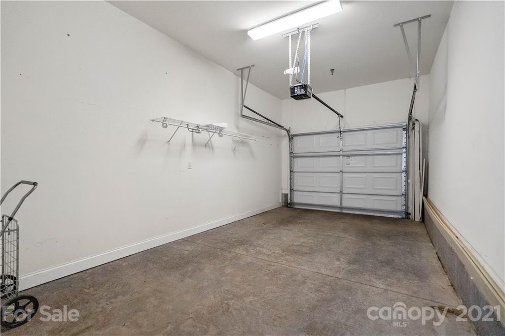 8929 Rosalyn Glen Road, Unit 108 Cornelius, NC 28031 - Photo 26 of 28 a view of a room with an empty space