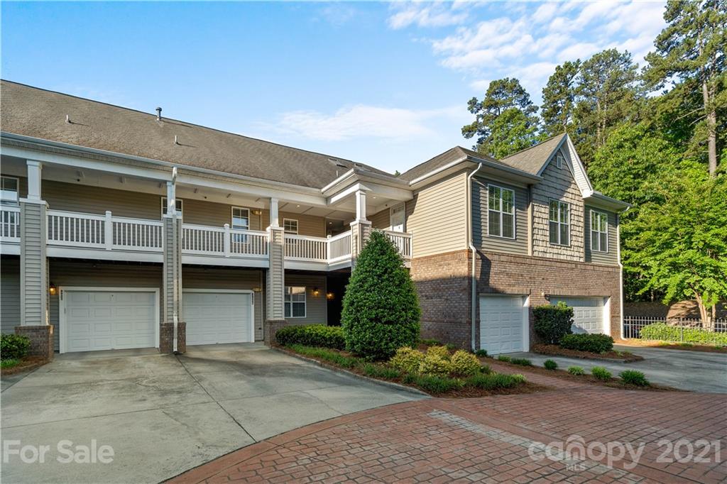8929 Rosalyn Glen Road, Unit 108 Cornelius, NC 28031 - Photo 27 of 28 front view of a house with a street