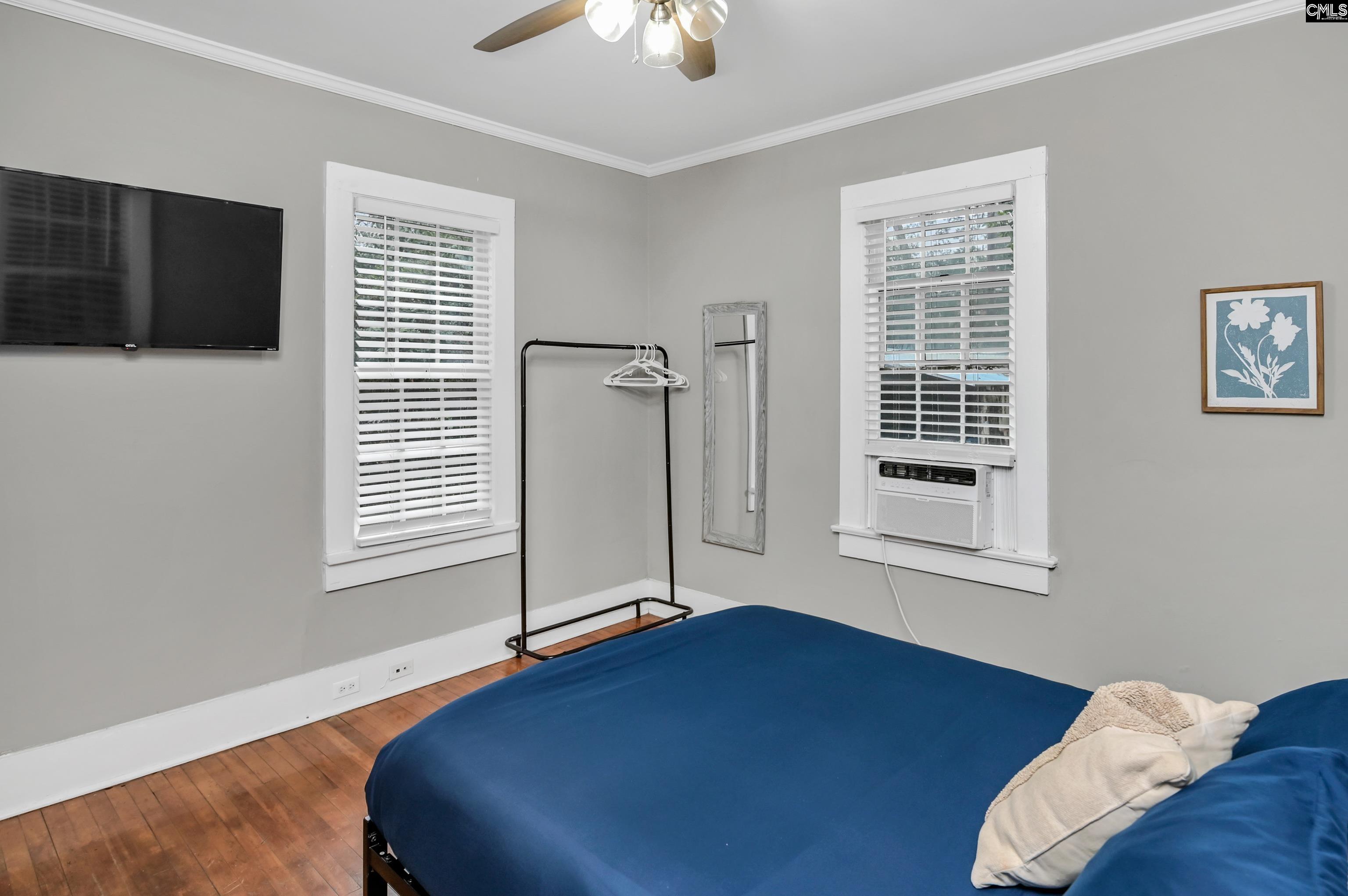 2227 Bull Street Columbia, SC 29201 - Photo 17 of 38 a view of a livingroom with wooden floor and a window