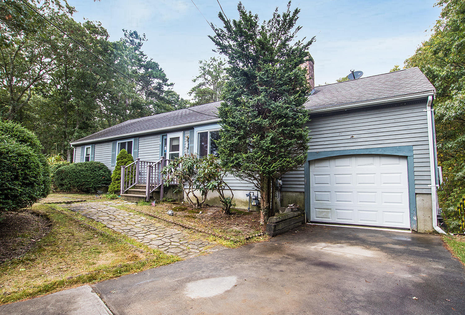 58 Ensign Road Centerville, MA 02632 - Photo 1 of 12 a view of house with outdoor space and sitting area