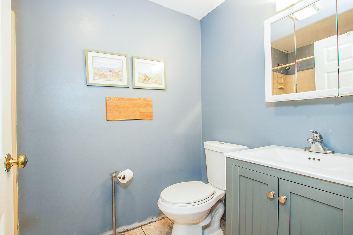 58 Ensign Road Centerville, MA 02632 - Photo 11 of 12 a bathroom with a toilet sink and mirror