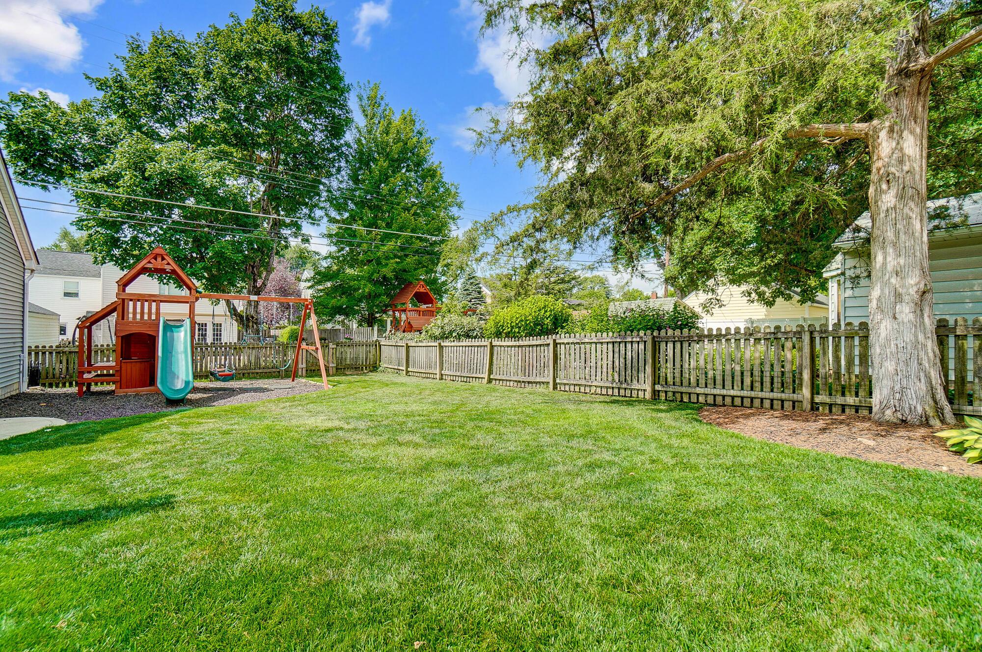 1539 Cardiff Road Columbus, OH 43221 - Photo 3 of 45 The fenced yard also has a large driveway play area with a gate to keep everyone safe!