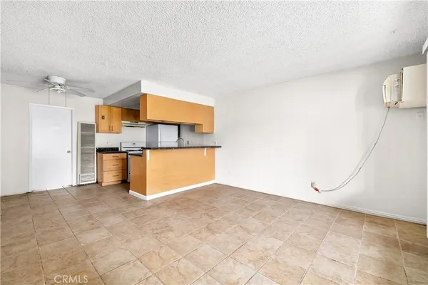 a view of a kitchen with a sink