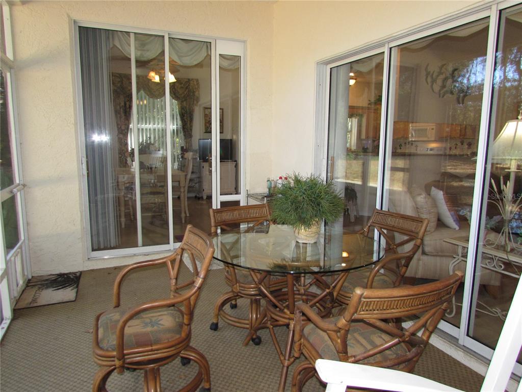 19367 Southwest 101st Place Road Dunnellon, FL 34432 - Photo 24 of 38 a dining room with furniture and window